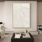 Vertical framed Whitecaps art with ocean wave rhythm in white and beige tones.