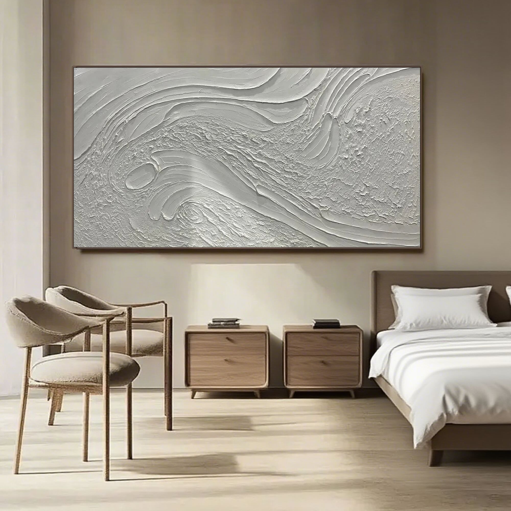 Minimalist textured art in a serene dining room setting with natural light.