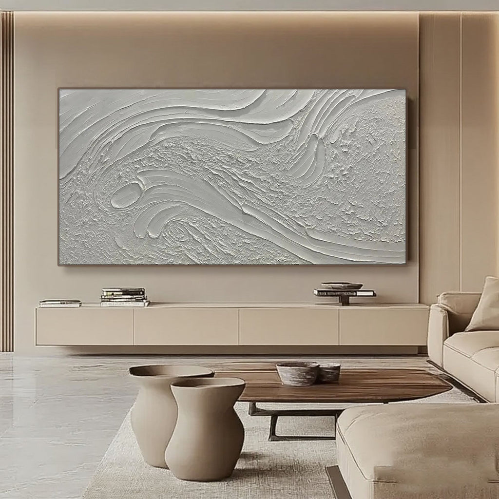 Horizontal canvas art with a 3D textured design in a modern living room setting.