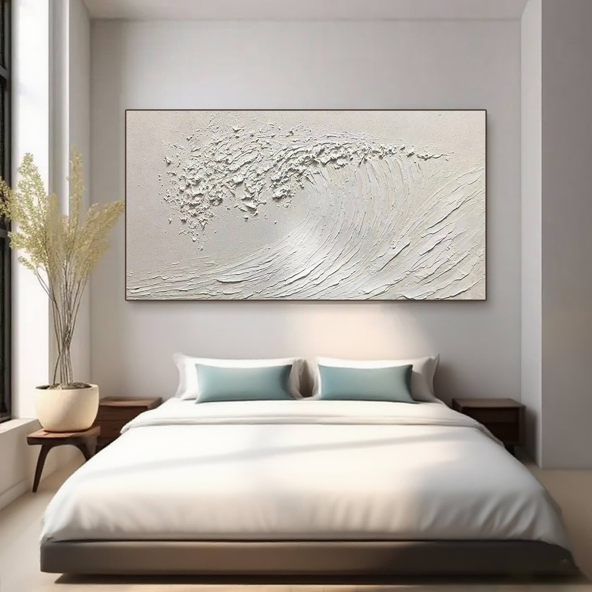 Silent Curl minimalist ocean art above bed in modern bedroom.
