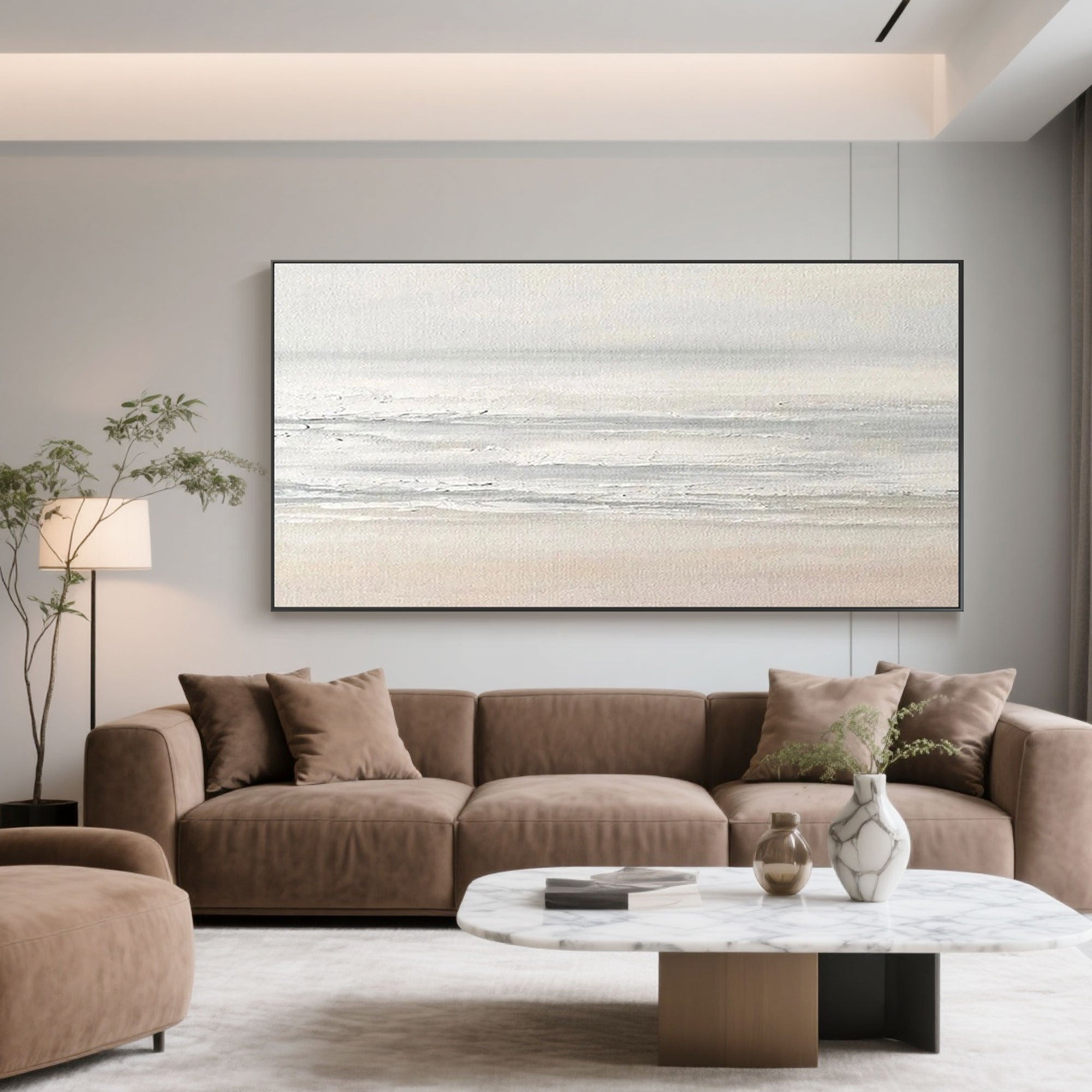 Modern living room featuring minimalist abstract seascape art above a sofa.