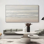 Minimalist abstract seascape art with golden frame hanging on the wall