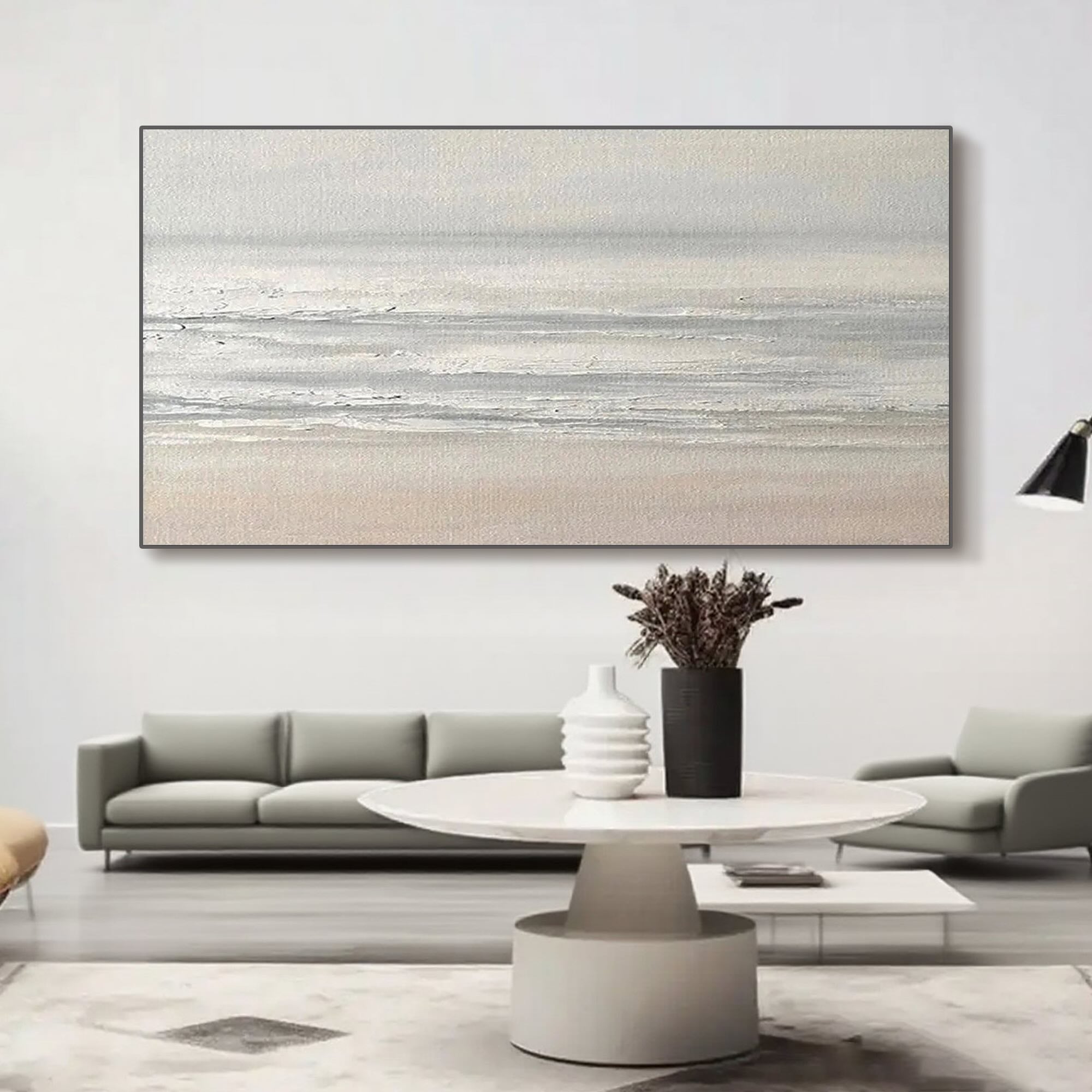 Minimalist abstract seascape art with golden frame hanging on the wall