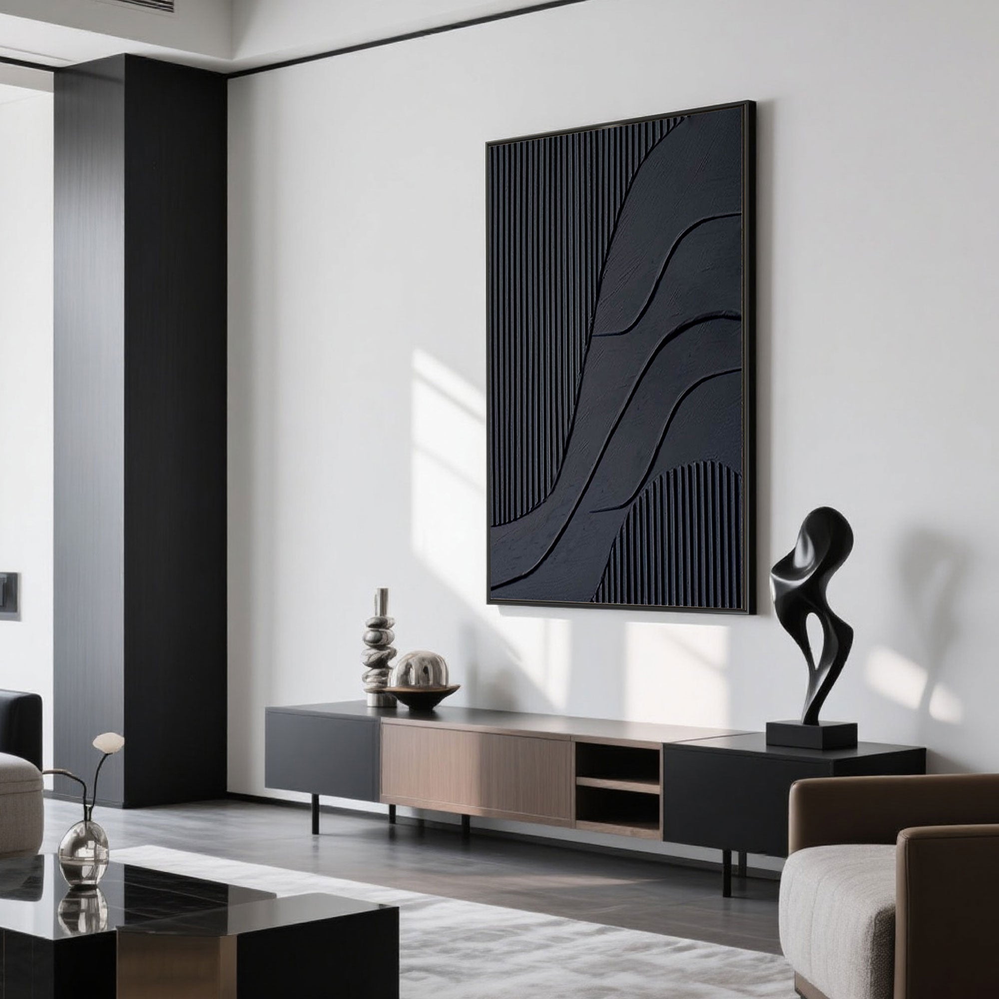 Modern living room with minimalist black textured canvas art above console table.