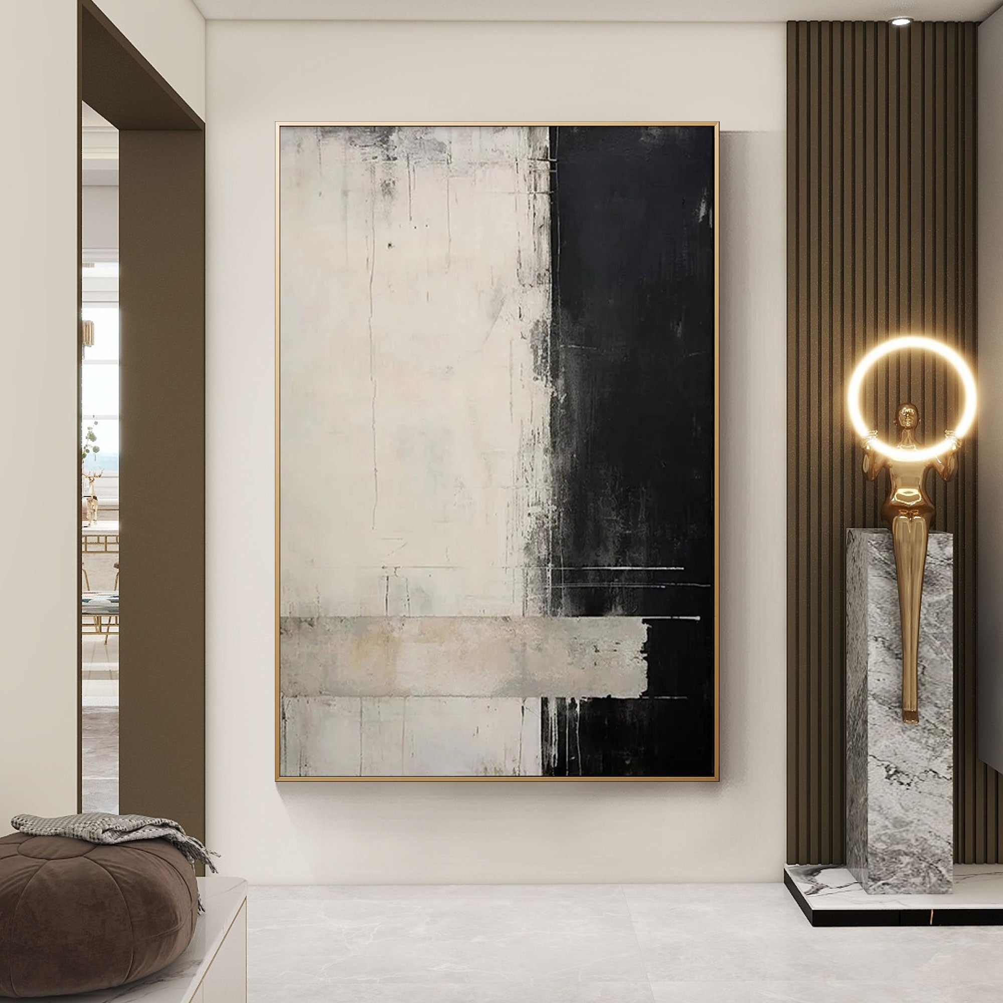 Minimalist black and white abstract canvas art in modern living space.