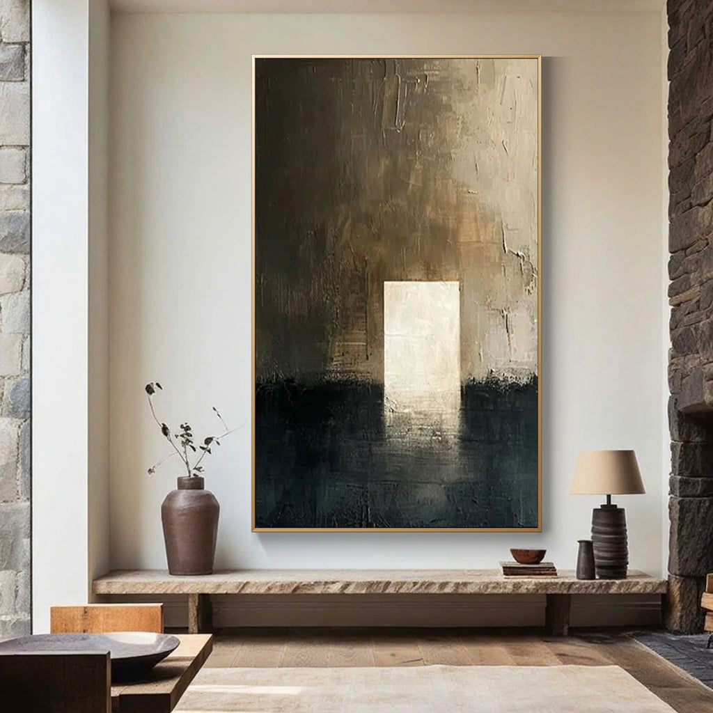 Living room with minimalist brown canvas art above console table.