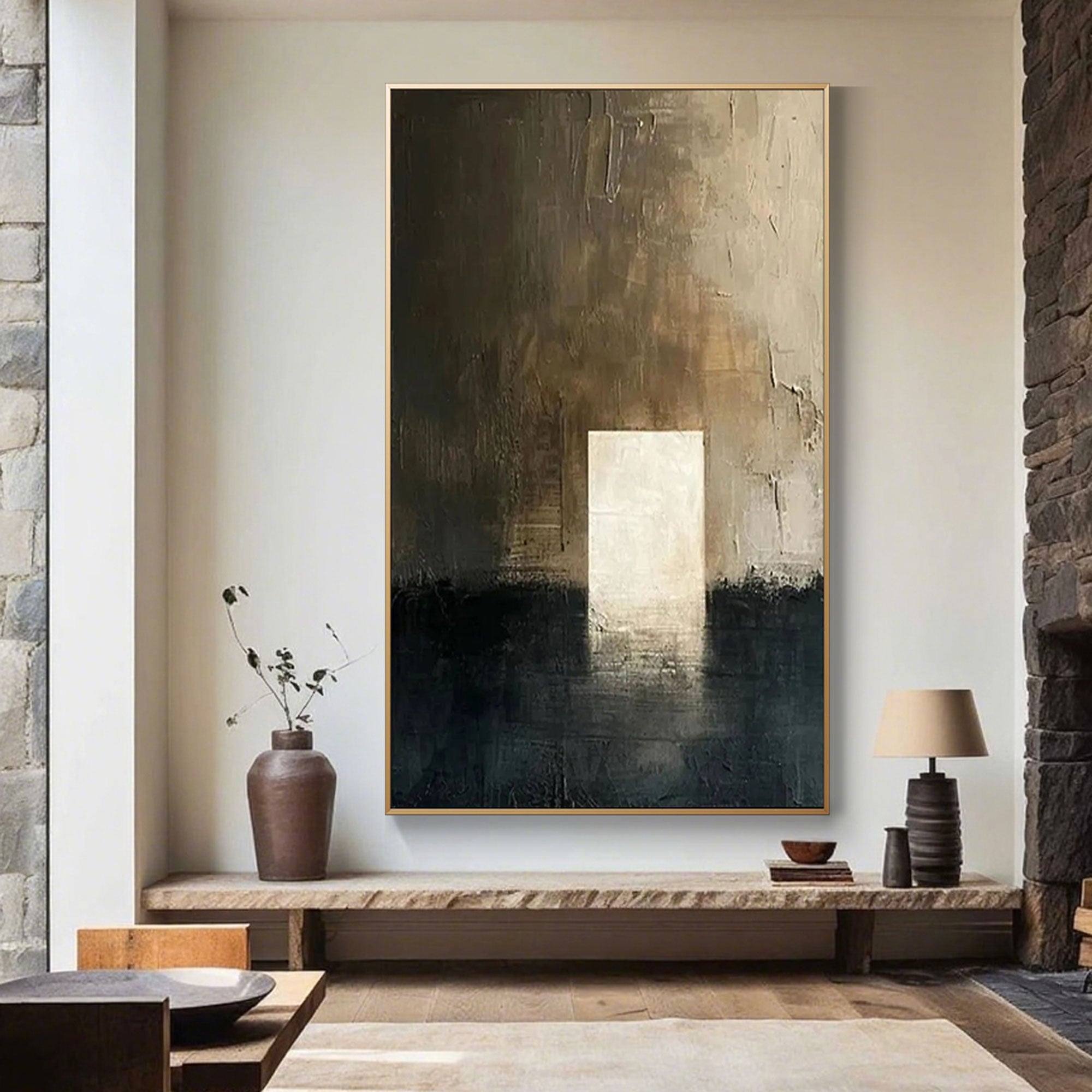 Living room with minimalist brown canvas art above console table.