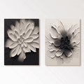 Two minimalist floral abstract canvas artworks with sculptured petals, textured brushstrokes, and monochromatic color schemes (gray, black, white) on contrasting dark and light backgrounds.