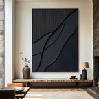 Noirflow minimalist black geometric wall art in a naturally lit living space.