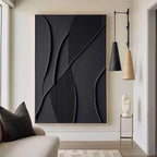 Lumi Gallery's minimalist geometric 3D textured black wall art with shadow lines in modern living room