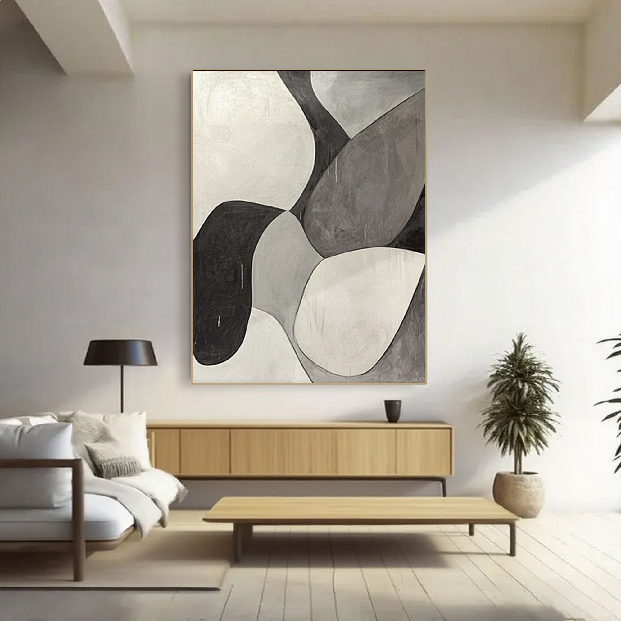 Minimalist canvas art above console table in living space.