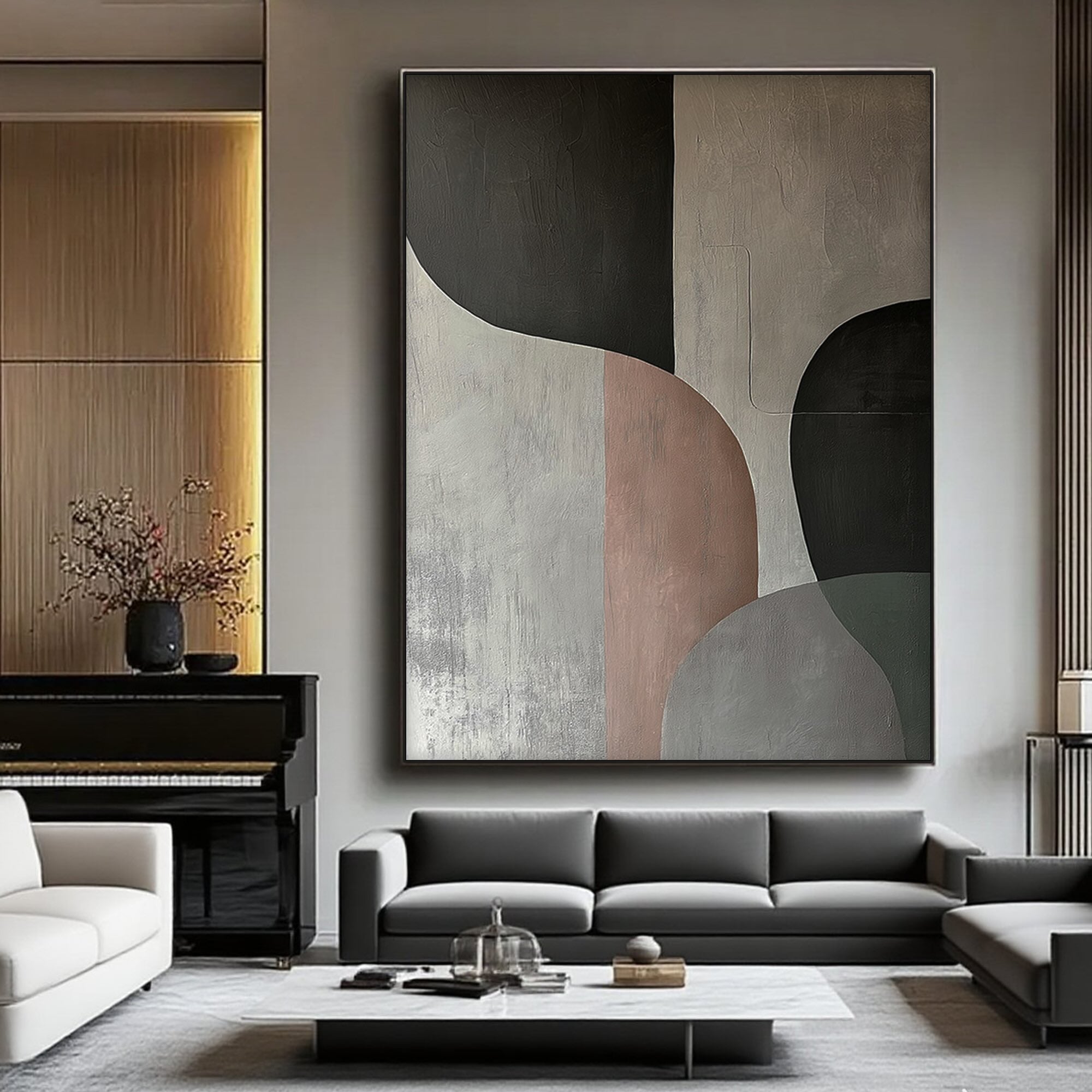Geometric canvas art above a sofa in a contemporary interior.