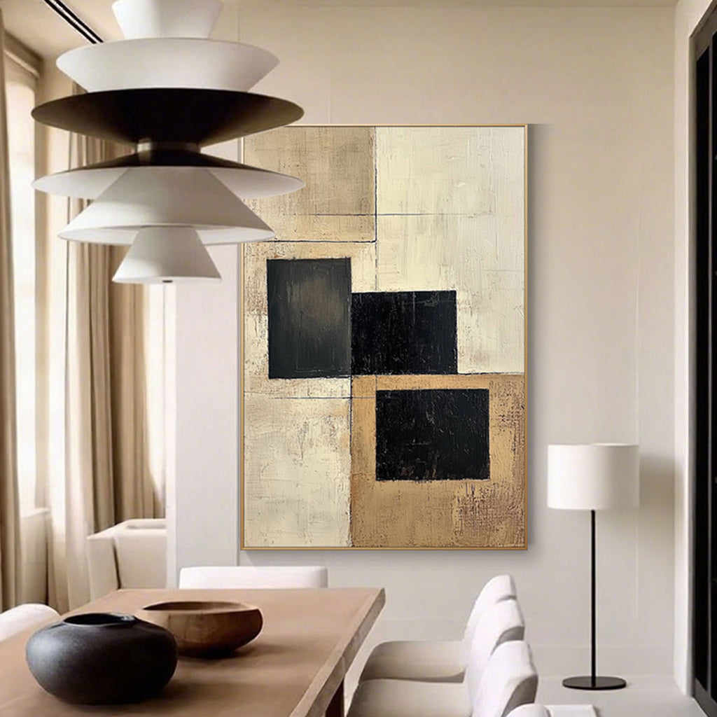 Close up of textured black and beige geometric wall art.