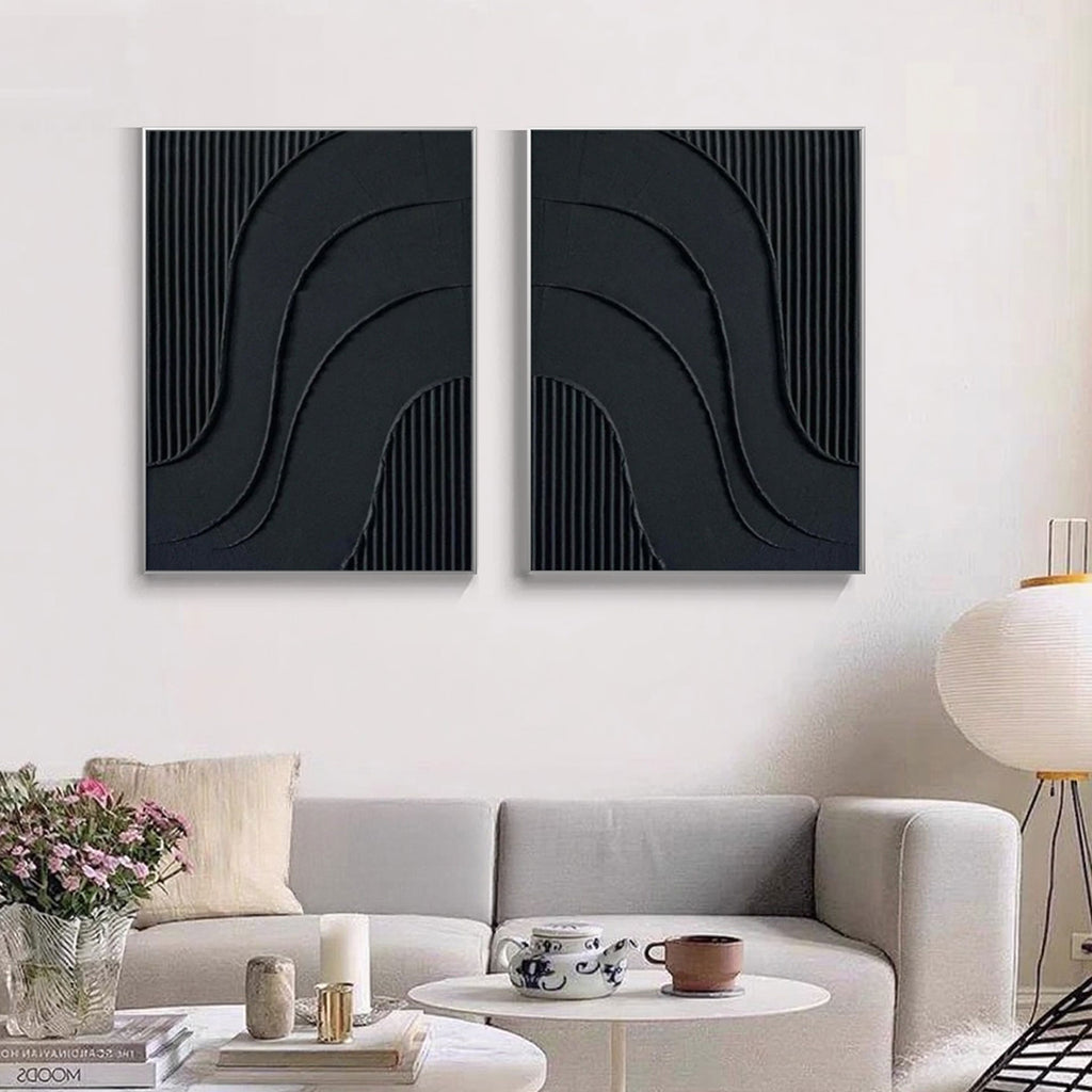 Black geometric modern art featuring curved reliefs and vertical textures.