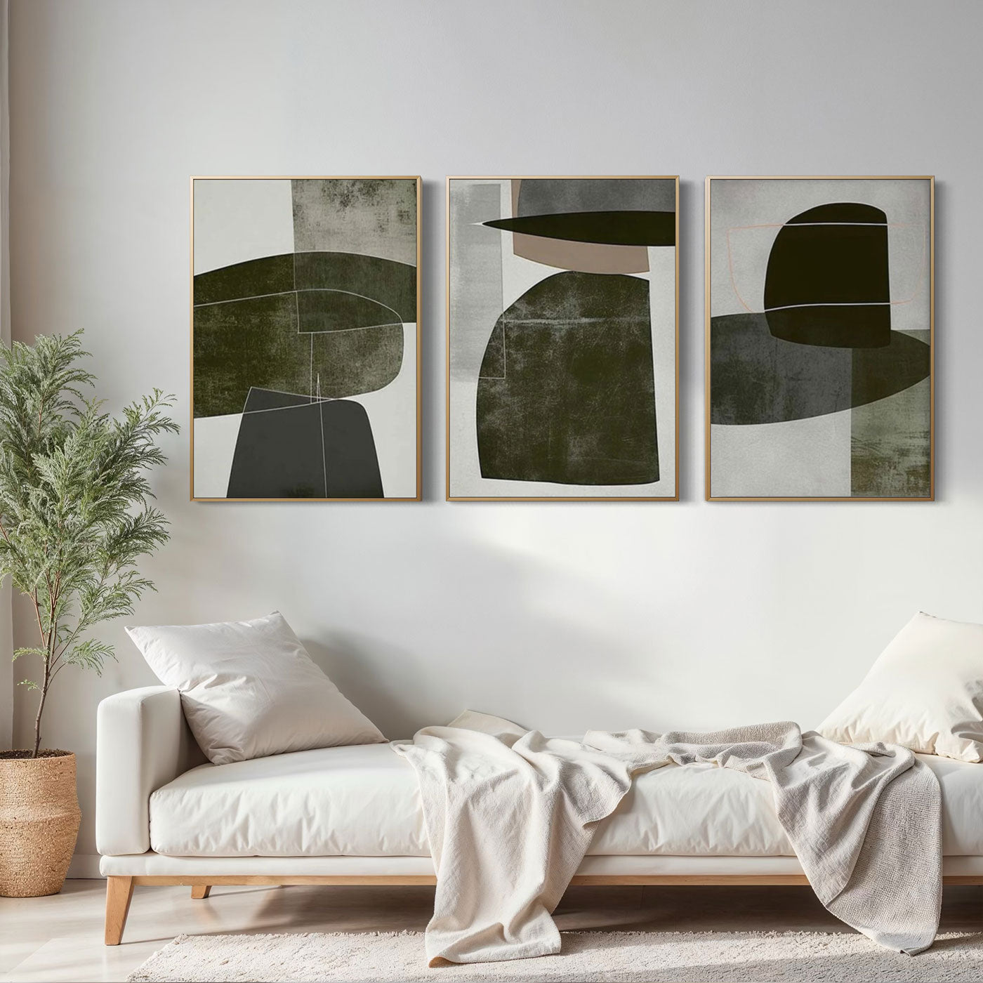 Strata minimalist art set in earthy tones above a modern sofa.