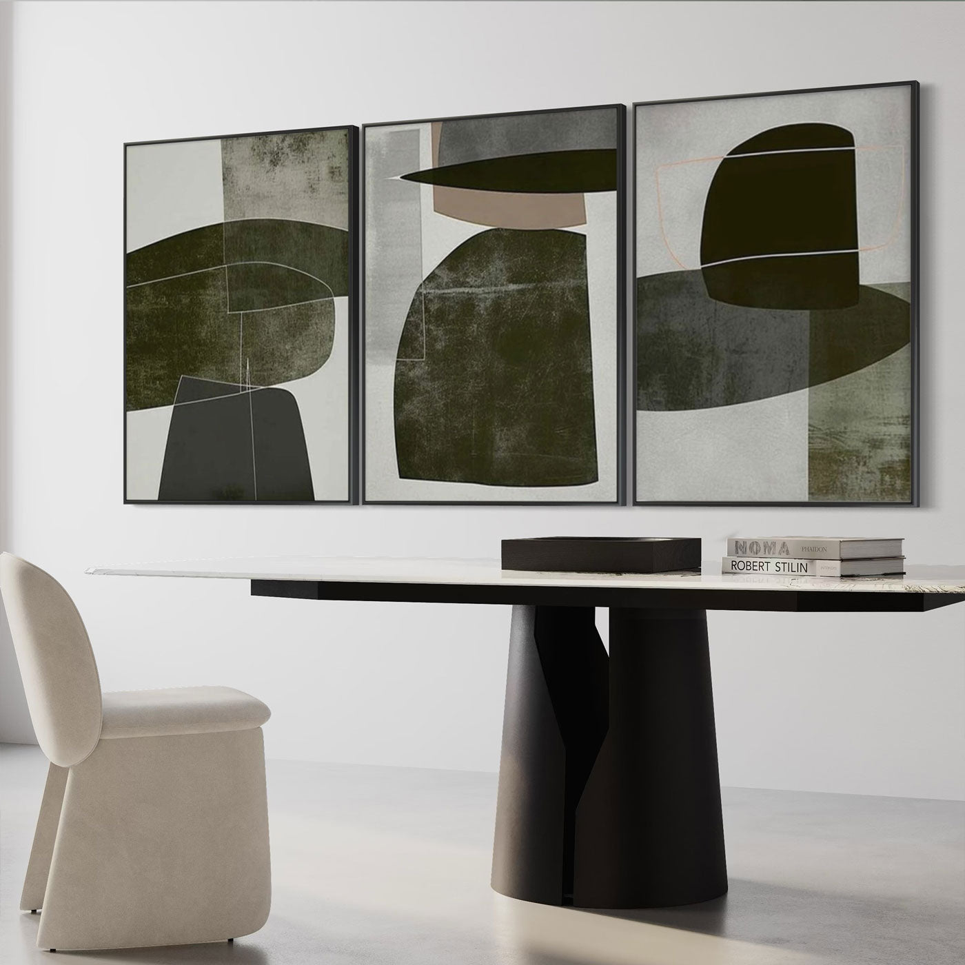 Minimalist geometric canvas art in a dining room setting.