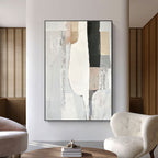 Neutral tone geometric wall art in modern living space.