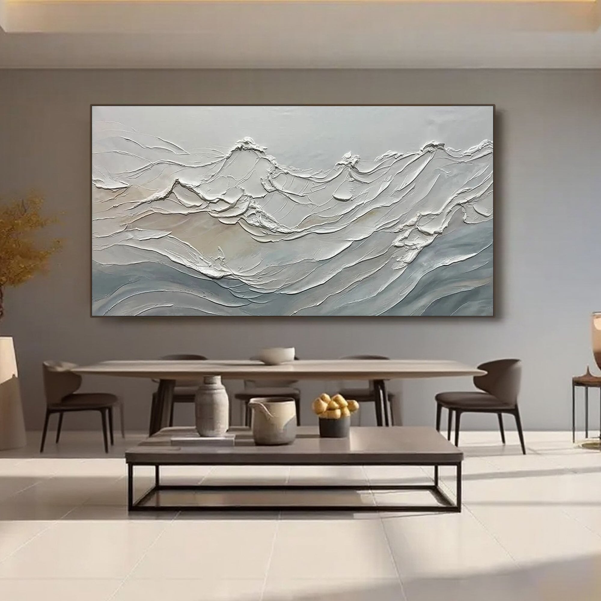 Minimalist ocean wave painting hangs in a modern dining room.