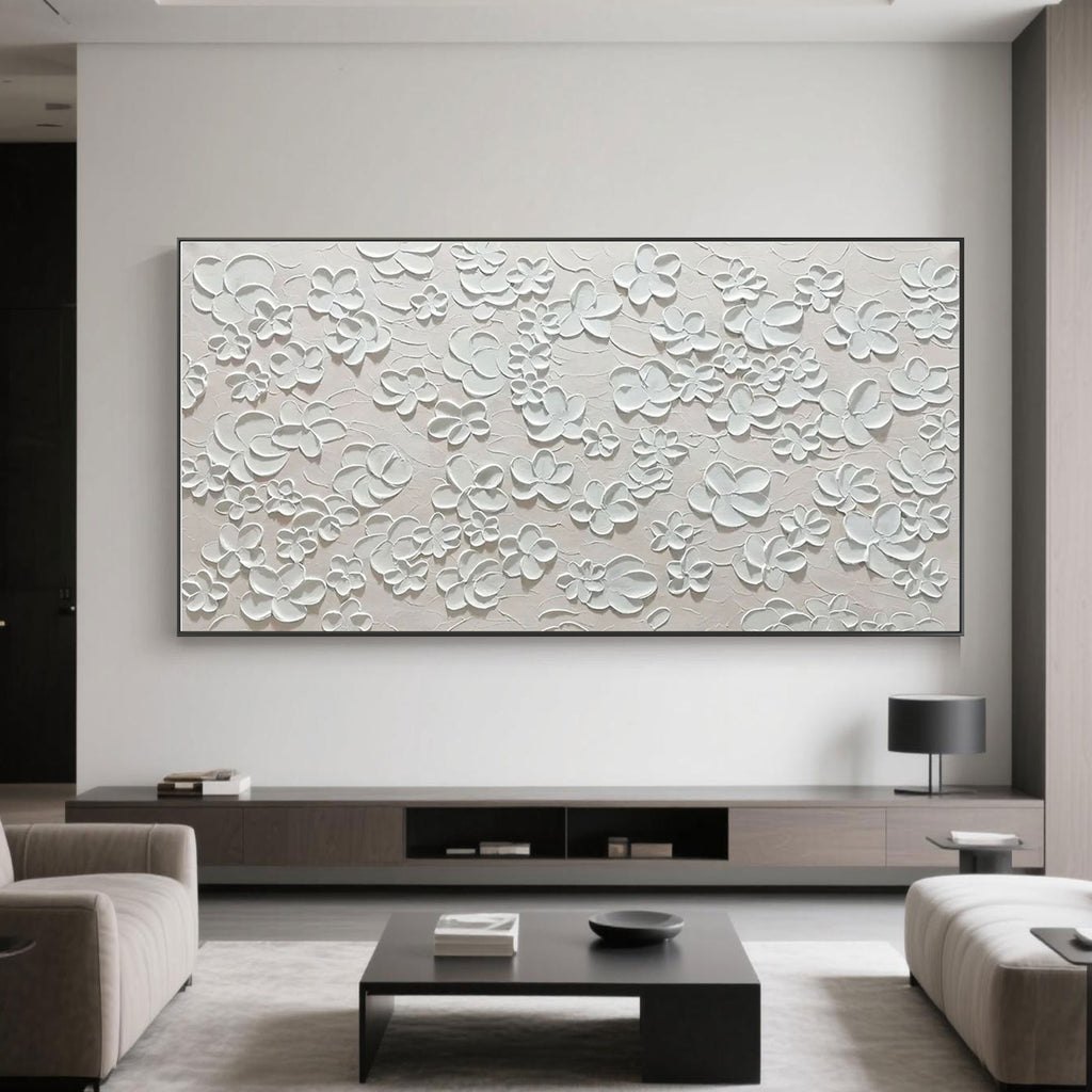 Minimalist textured floral painting in a modern living room.
