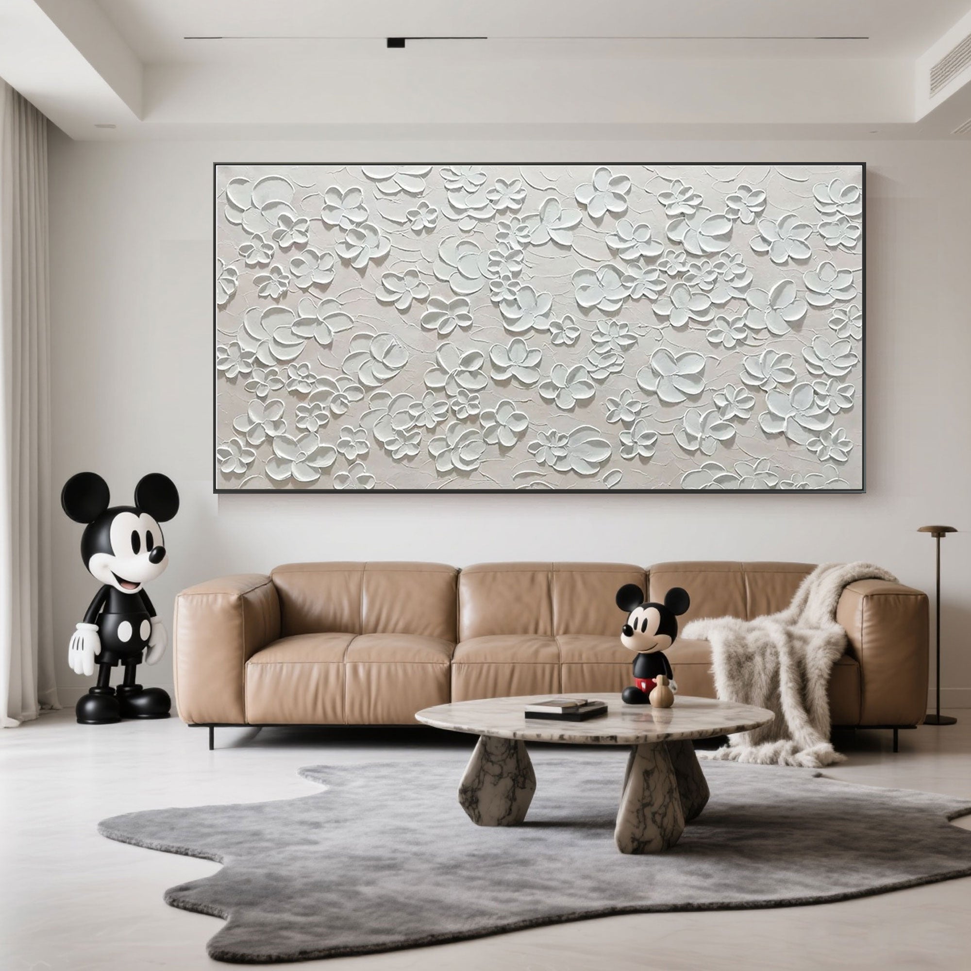 Minimalist textured floral painting in a modern living room.