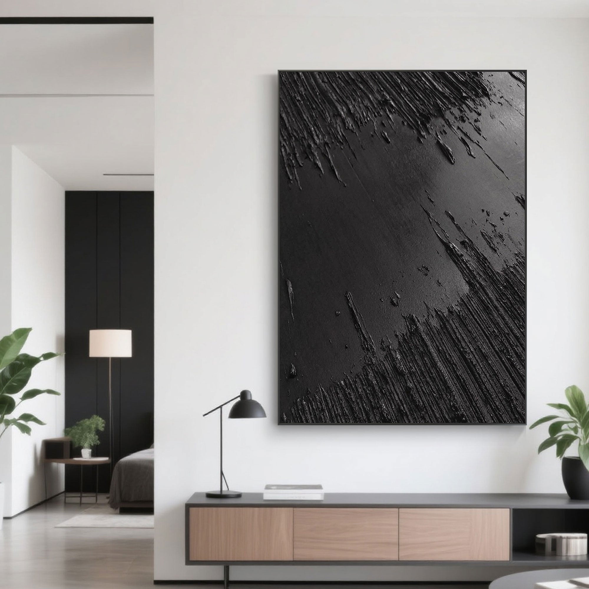 Wabi-Sabi black canvas art in a well-lit entryway.