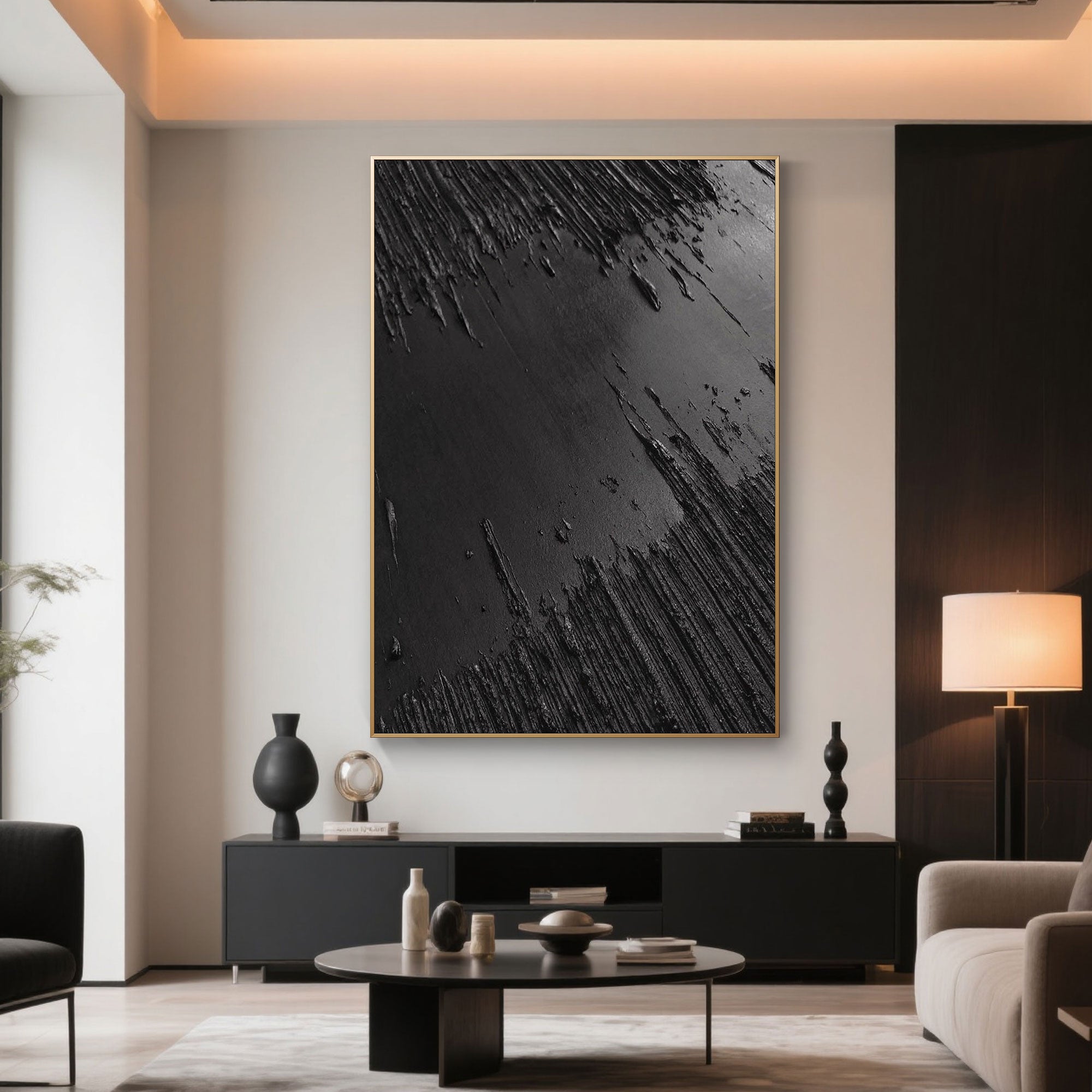 Black canvas art in a living room with a fireplace.