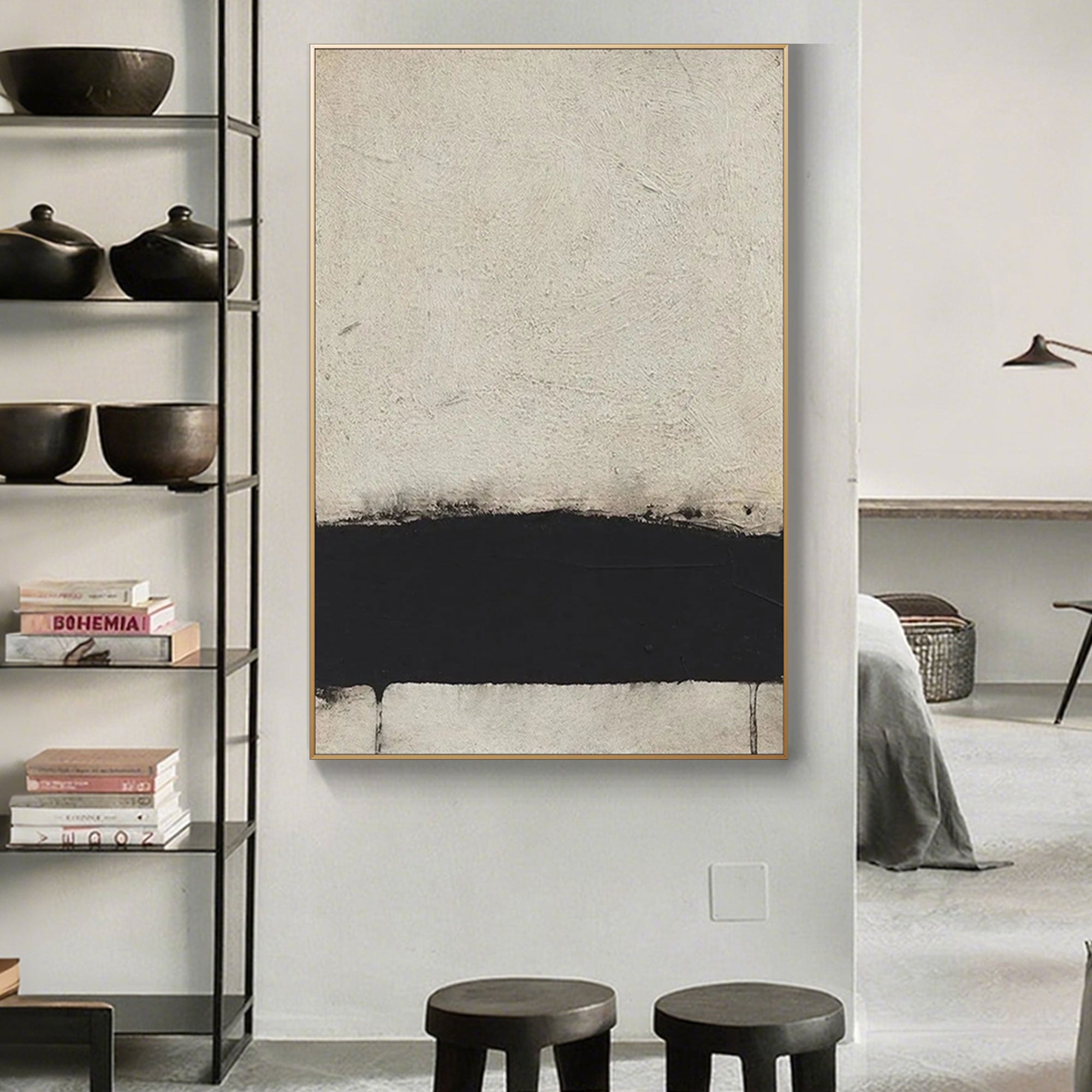 Vertical canvas art in bedroom, minimalist black stripe design.
