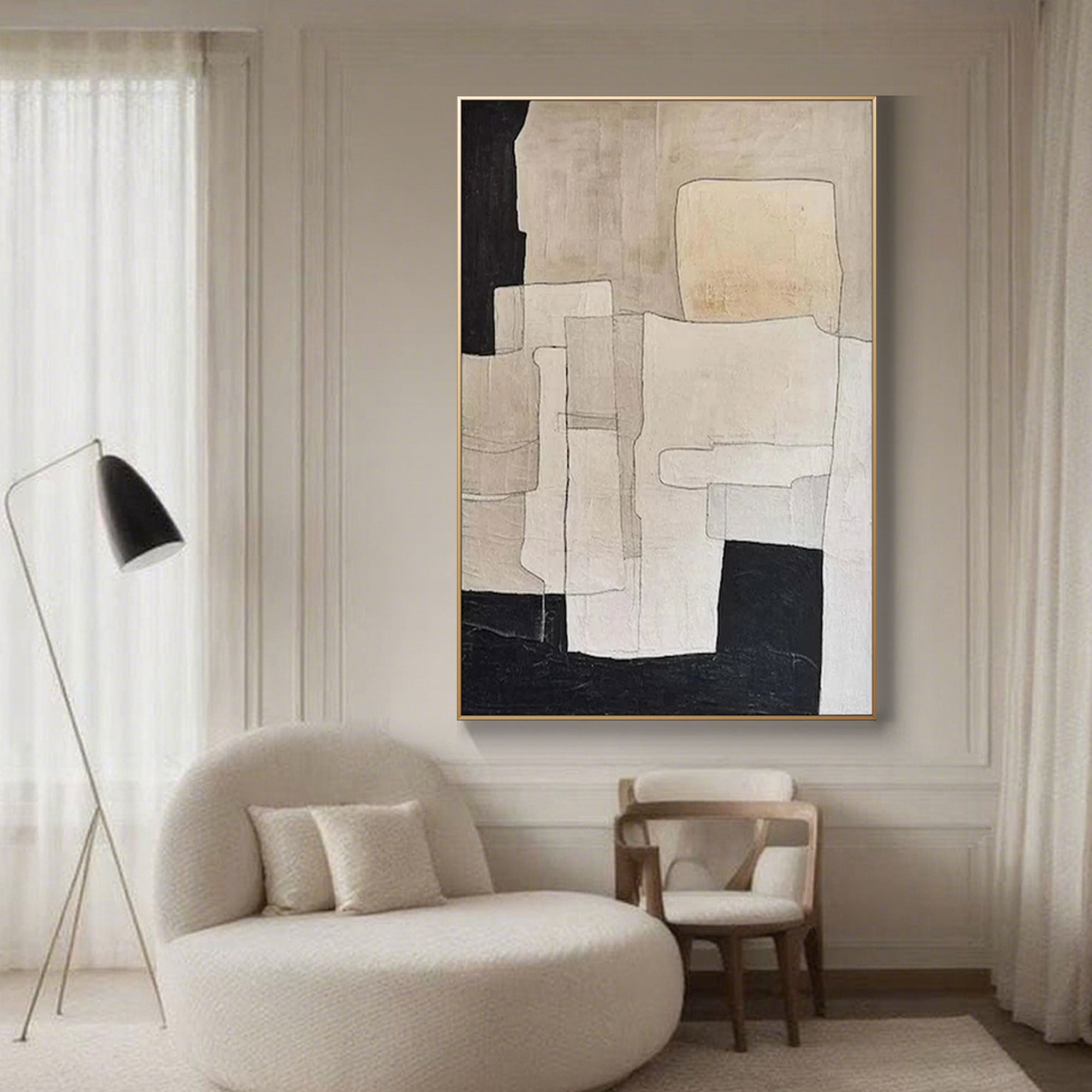 Beige and black geometric canvas art in a room interior.