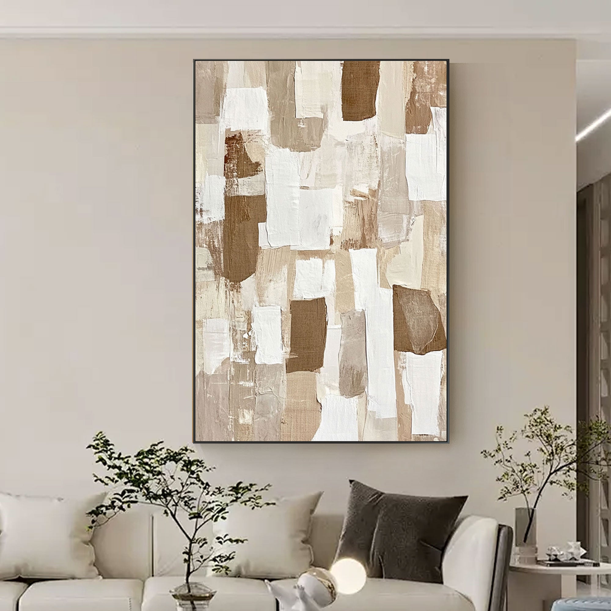 Lightfall abstract canvas art above a white sofa in living space.