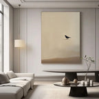 Zen minimalist bird wall art with black bird on textured beige canvas in modern living room
