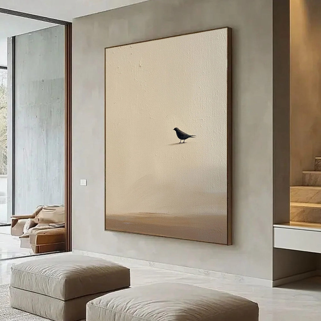 Zen minimalist bird wall art with black bird on textured beige canvas in modern living room