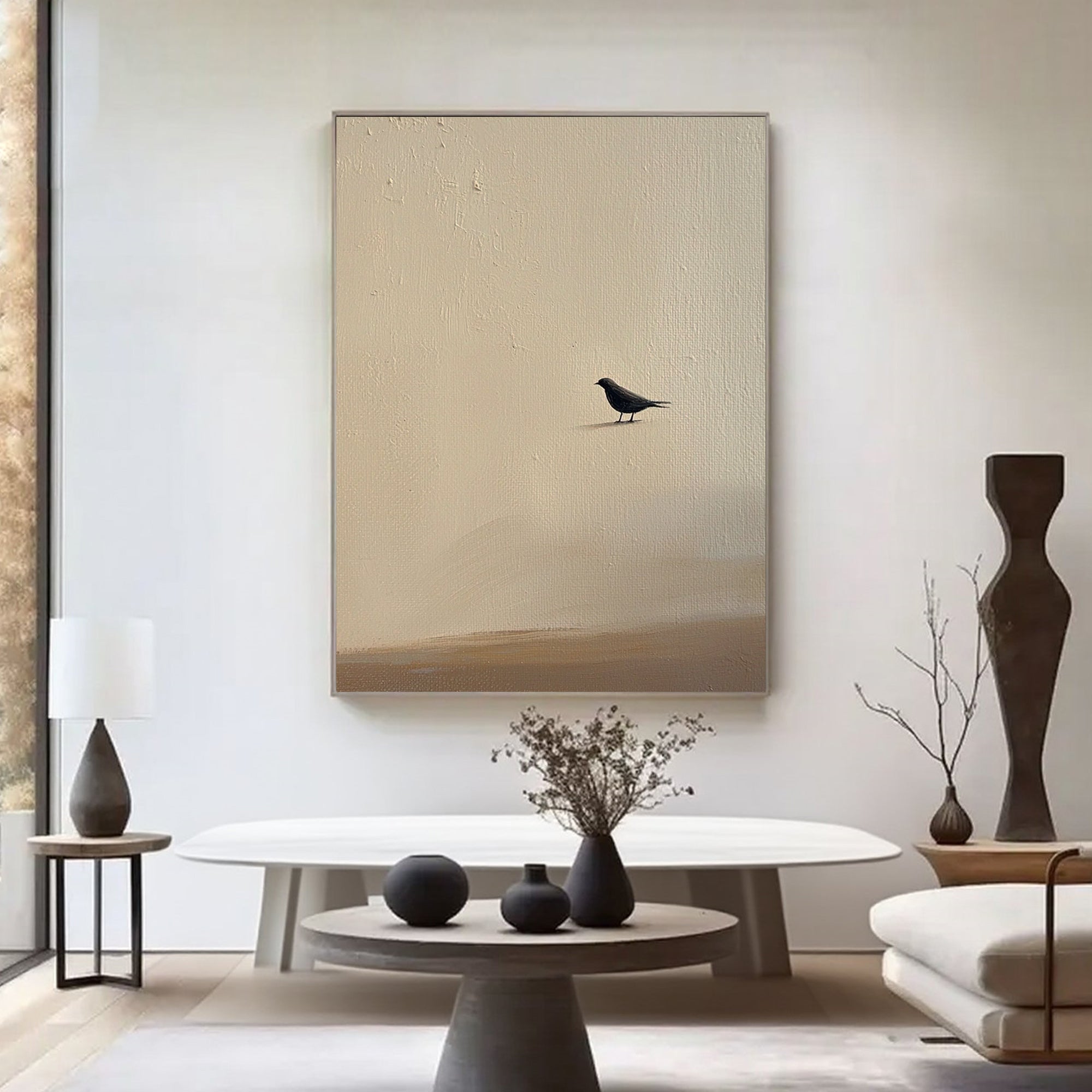 Zen minimalist bird wall art - black bird silhouette on beige textured canvas in modern living room