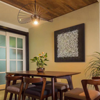 Lumi Gallery's minimalist abstract wall art 'Chaos' on black canvas in dining room with wooden ceiling