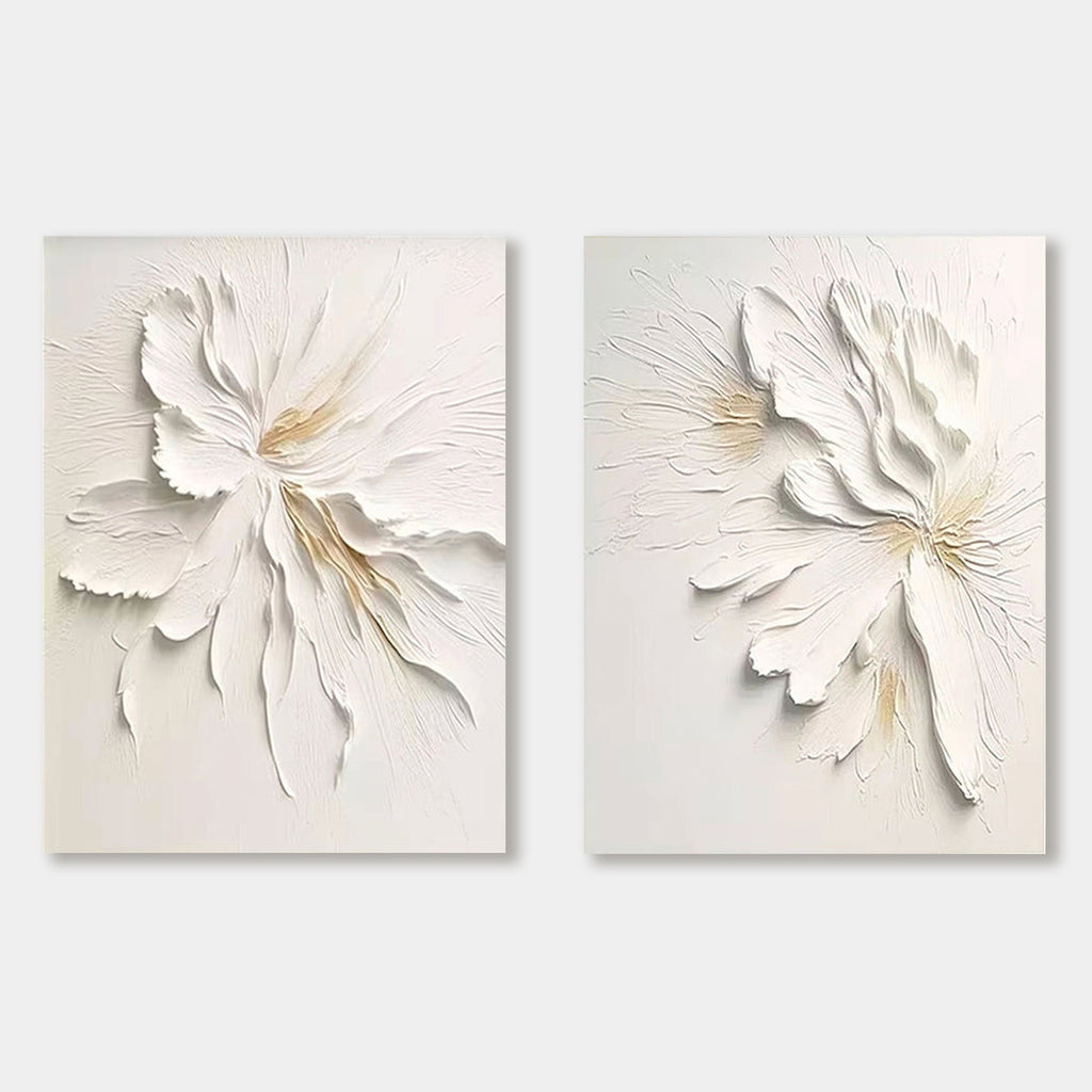Minimalist floral canvas art set with 3D textured white and beige flower petals.