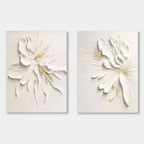 Minimalist floral canvas art set with 3D textured white and beige flower petals.