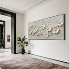 Modern 3D floral wall art with a black frame in a dining room.