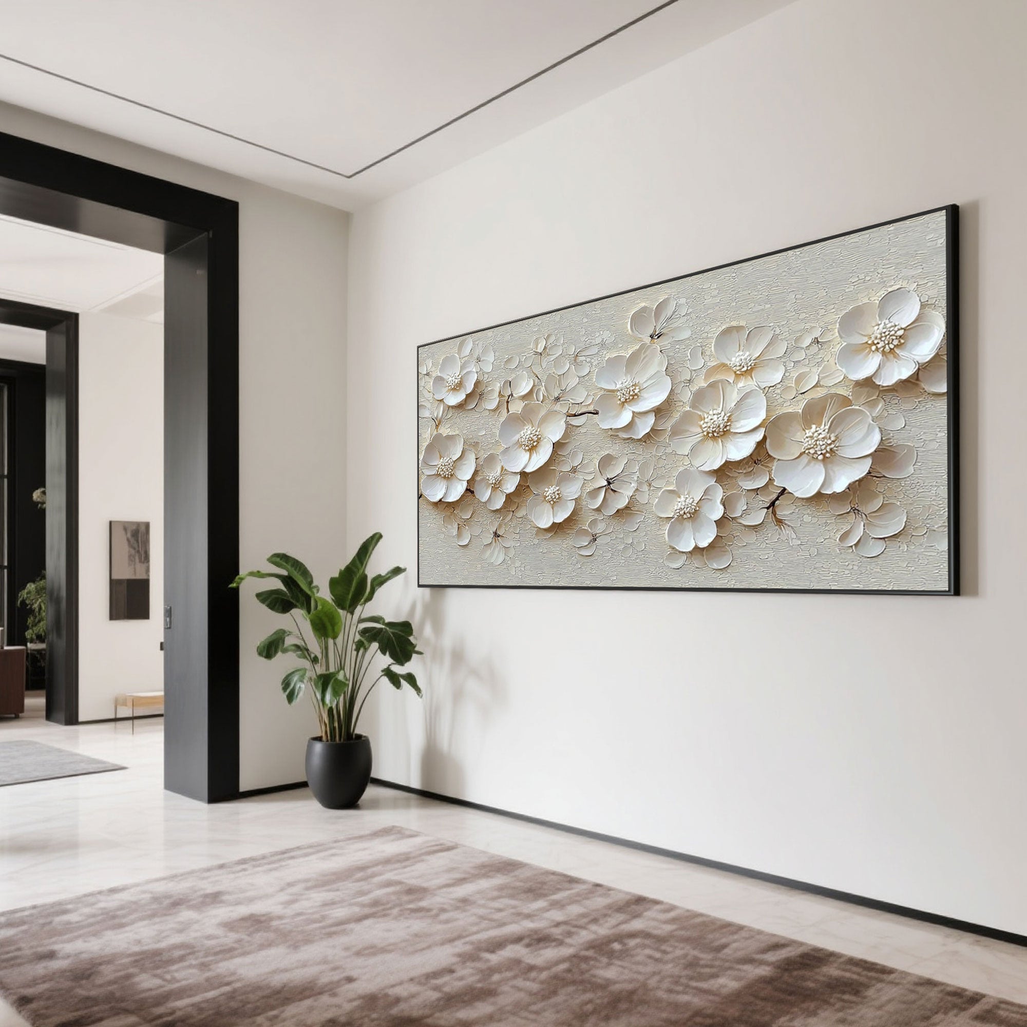 Modern 3D floral wall art with a black frame in a dining room.