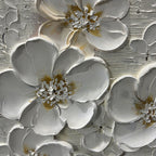 Close-up of hand-painted white flower petals with raised detailing.