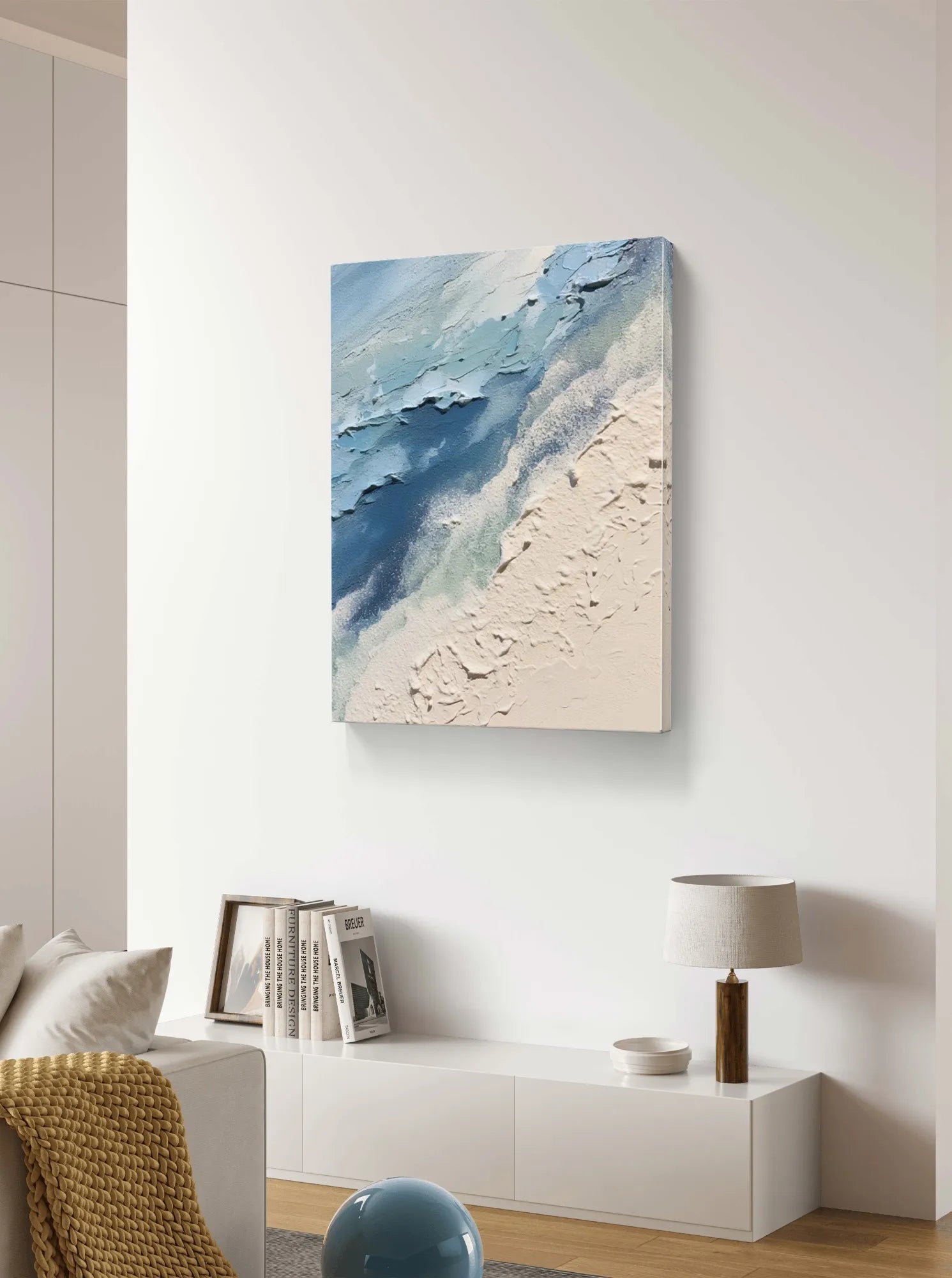 Abstract ocean waves and sandy beach painting with blue and beige tones