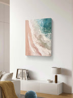 Abstract beach scene with pink and blue tones, featuring textured ocean waves and sandy shore