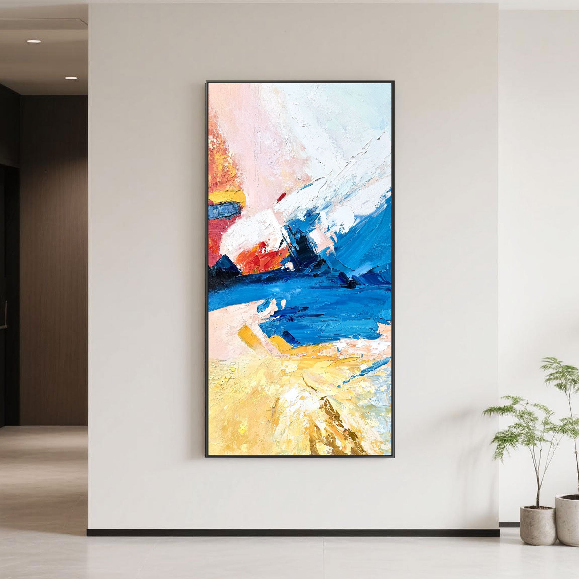 Modern hallway featuring colorful abstract wall art.