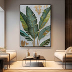 Framed banana leaf botanical art in a contemporary living space.