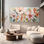Contemporary living room featuring colorful floral wall art in soothing shades of peach, pink, and white.