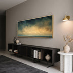 Ocean painting with gold frame in modern living room.
