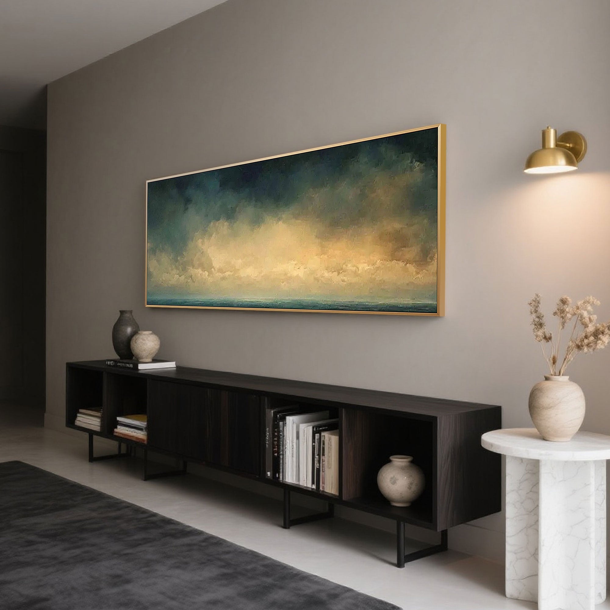 Ocean painting with gold frame in modern living room.
