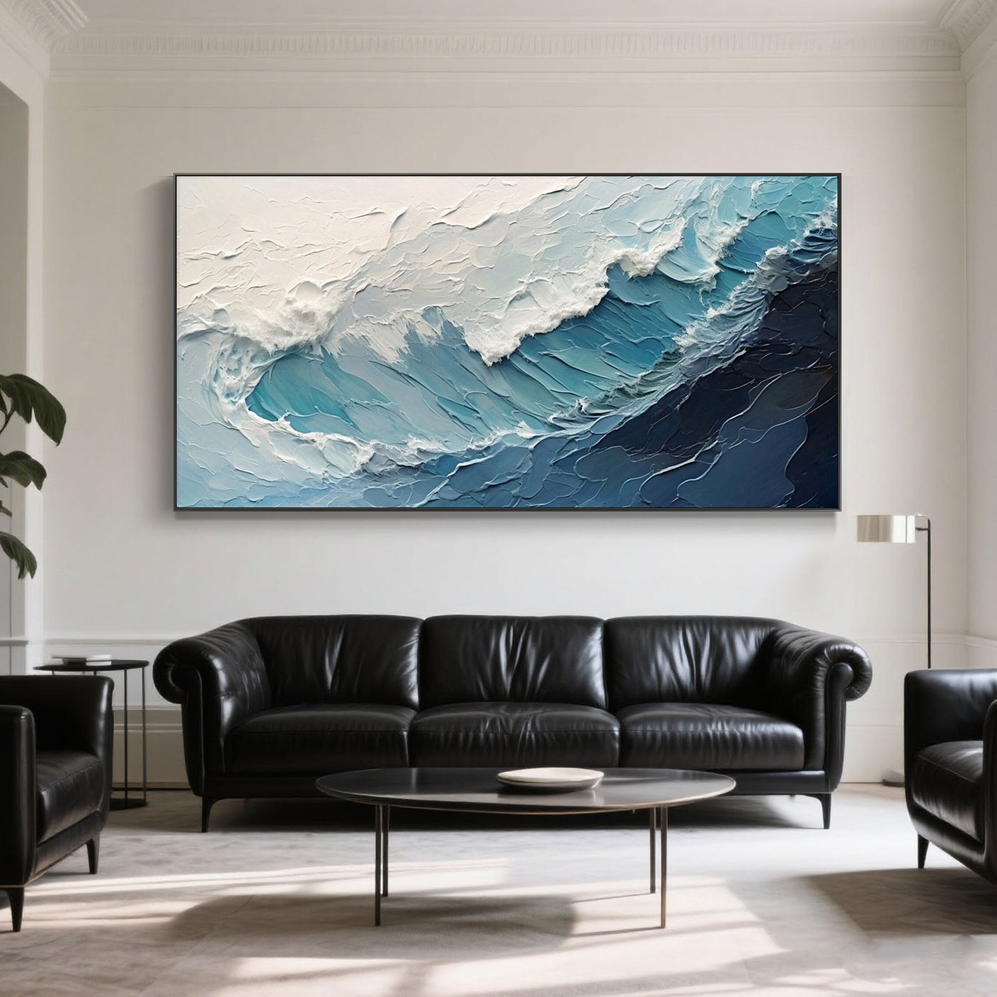 Modern ocean wave canvas art with textured, hand-painted brushstrokes in shades of blue and white.