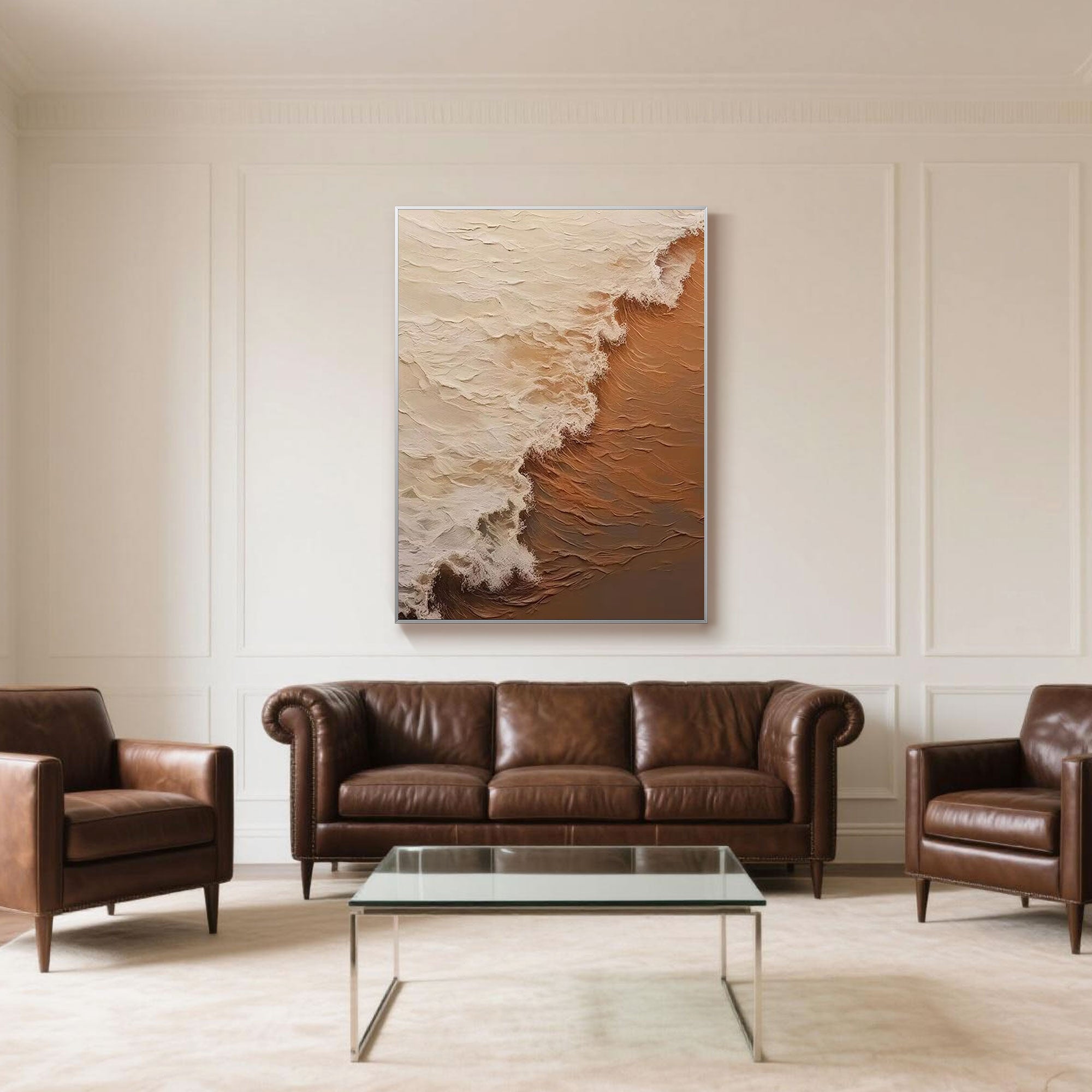 Textured abstract seascape art above a brown leather couch.