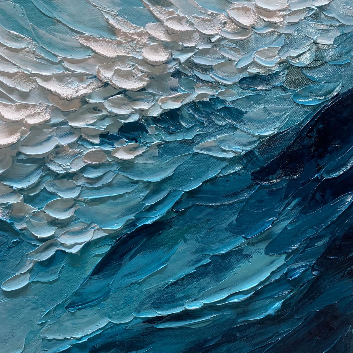 Close-up of textured acrylic layers in blue and white wave painting.
