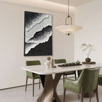 Sculptural abstract wave painting in black and white, hand-painted on oversized vertical canvas using eco-friendly materials