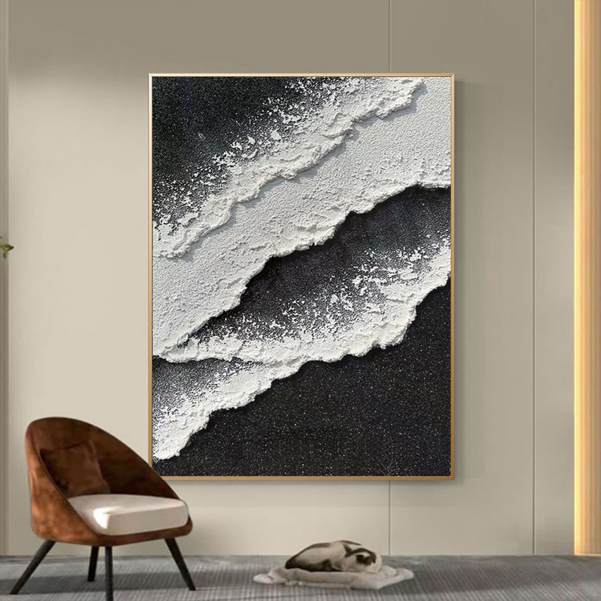Hand-painted abstract ocean canvas in monochrome tones with thick texture, displayed in a contemporary living room